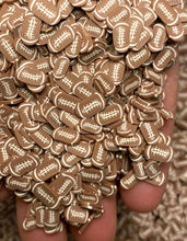 Load image into Gallery viewer, Football Polymer Clay Slices 5mm.  0.5 oz bag
